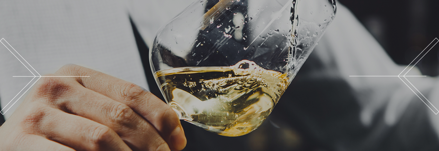 How do you evaluate the color of a wine?